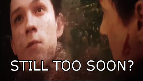 A young man’s face fades into dust as he looks up, appearing distressed. Bold white text at the bottom reads, "STILL TOO SOON?.