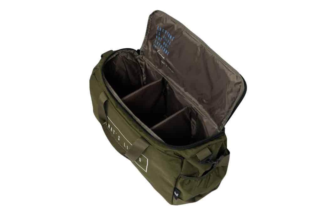 The TRIARC Duffle Bag in olive green features a top zipper, spacious interior with three compartments, an inner lid pocket, two handles, and a side pocket.