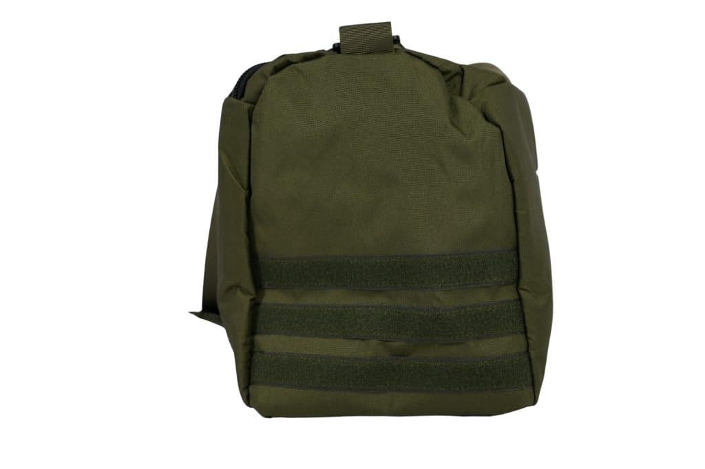 The TRIARC Duffle Bag, in olive green, features a top handle and horizontal webbing straps on the front, displayed against a white background.